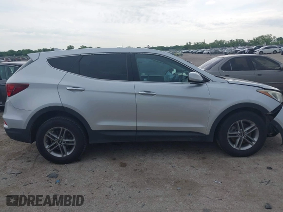 2017 Hyundai Santa Fe 2.4L with VIN 5XYZTDLB5HG453474, listed as a IAAI auction lot 42191590 with 167,590 mi miles and . Bid and sale history available at DreamBid. Image 14.