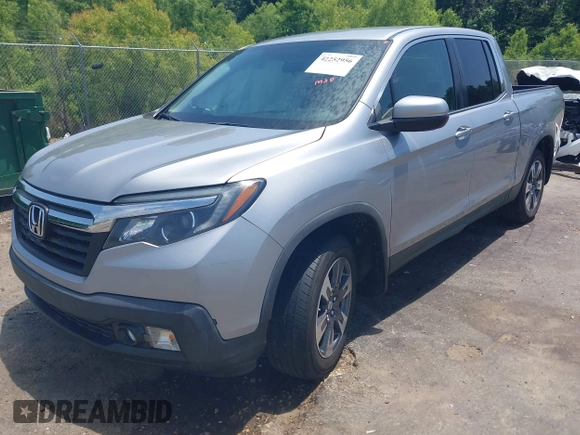2018 Honda Ridgeline RTL z VIN 5FPYK2F5XJB001064, wystawiony jako IAAI lot #42252956 z przebiegiem 95 272 mil mil oraz . Historia ofert i sprzedaży dostępna na DreamBid. Obrazek 2.