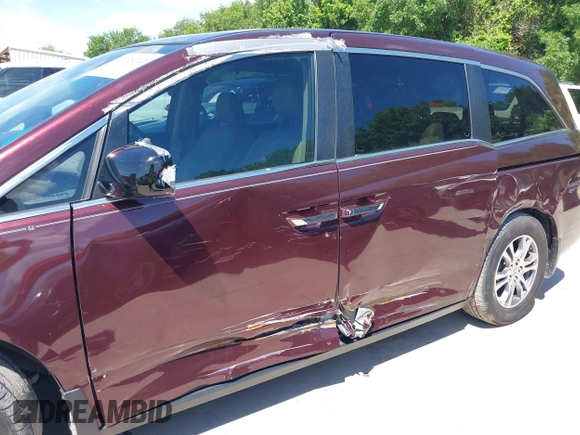 2011 Honda Odyssey EX-L with VIN 5FNRL5H60BB094647, listed as a IAAI auction lot 42223712 with 202,612 mi miles and . Bid and sale history available at carsss.com. Image 6.