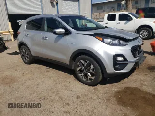 2020 Kia Sportage EX z VIN KNDPNCAC7L7705139, wystawiony jako Copart lot #52307635 z przebiegiem 125 755 mil mil oraz Szkoda całkowita • Salvage title. Historia ofert i sprzedaży dostępna na DreamBid. Obrazek 4.