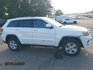 2016 Jeep Grand Cherokee Laredo with VIN 1C4RJFAG0GC324917, listed as a IAAI auction lot 42709325 with 271,953 mi miles and . Bid and sale history available at DreamBid. Image 14.