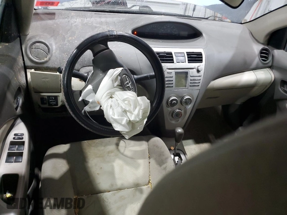 2009 Toyota Yaris with VIN JTDBT903094047243, listed as a Copart auction lot 47296455 with 235,483 mi miles and Salvage Title. Bid and sale history available at DreamBid. Image 8.