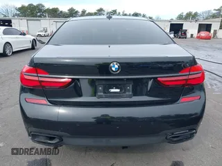 2019 BMW 7 Series 740i with VIN WBA7E2C57KB217973, listed as a IAAI auction lot 39064321 with 54,818 mi miles and . Bid and sale history available at DreamBid. Image 16.