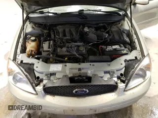 2004 Ford Taurus SE with VIN 1FAFP53U74G122231, listed as a Copart auction lot 42904044 with 116,851 mi miles and Salvage Title. Bid and sale history available at DreamBid. Image 12.