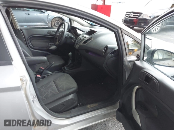 2013 Ford Fiesta SE with VIN 3FADP4BJ3DM173949, listed as a IAAI auction lot 40494276 with 141,061 mi miles. Bid and sale history available at carsss.com. Image 5.