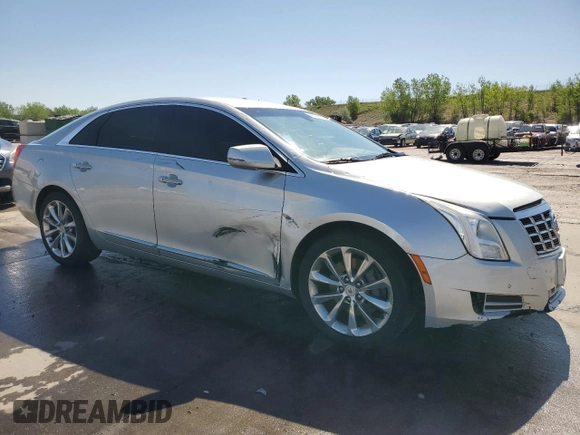 2013 Cadillac XTS Luxury with VIN 2G61R5S32D9131914, listed as a Copart auction lot 56569505 with 123,427 mi miles and Salvage title. Bid and sale history available at DreamBid. Image 4.