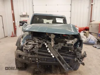2022 Ford Bronco z VIN 1FMEE5DP8NLB54954, wystawiony jako IAAI lot #42038688 z przebiegiem 45 182 mil mil oraz . Historia ofert i sprzedaży dostępna na DreamBid. Obrazek 12.
