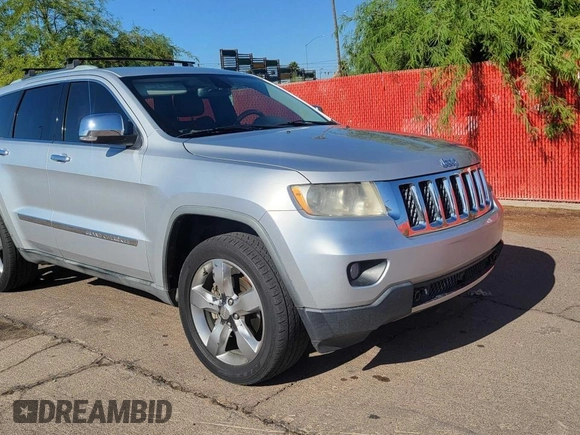 2011 Jeep Grand Cherokee Overland with VIN 1J4RR6GG7BC745066, listed as a Copart auction lot 66415905 with 164,264 mi miles and Clean title. Bid and sale history available at DreamBid. Image 1.