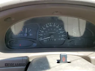 1998 Ford Escort SE with VIN 1FAFP13P7WW266180, listed as a Copart auction lot 61625005 with 143,982 mi miles and Salvage title. Bid and sale history available at DreamBid. Image 9.