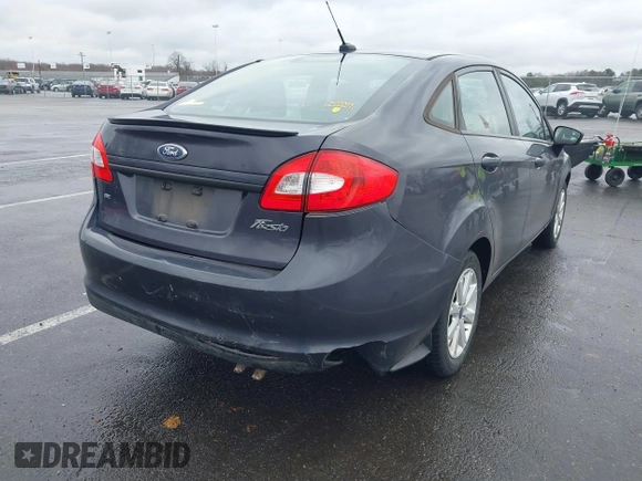 2012 Ford Fiesta SE with VIN 3FADP4BJ0CM155729, listed as a IAAI auction lot 41800447 with 90,091 mi miles. Bid and sale history available at carsss.com. Image 6.