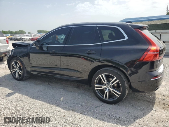 2018 Volvo XC60 Momentum with VIN LYV102RK6JB083622, listed as a Copart auction lot 56909505 with 89,197 mi miles and Salvage title. Bid and sale history available at DreamBid. Image 2.