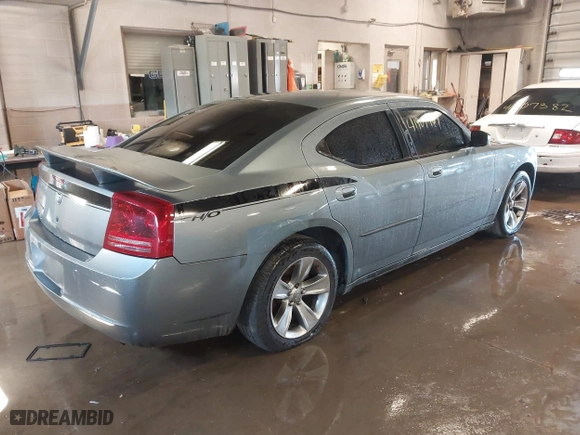 2006 Dodge Charger with VIN 2B3KA43G96H260361, listed as a IAAI auction lot 41907467 with 157,231 mi miles. Bid and sale history available at carsss.com. Image 4.