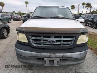 2003 Ford F-150 XL with VIN 1FTRF17W03NA02988, listed as a Copart auction lot 77209084 with Not Provided miles and Salvage Title. Bid and sale history available at DreamBid. Image 5.