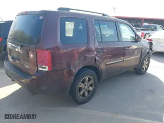 2011 Honda Pilot Touring with VIN 5FNYF4H91BB019009, listed as a IAAI auction lot 41827297 with 170,070 mi miles. Bid and sale history available at carsss.com. Image 4.