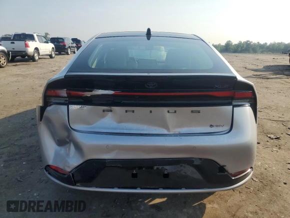 2024 Toyota Prius LE with VIN JTDADABU8R3020720, listed as a Copart auction lot 60815005 with 2,594 mi miles and Salvage title. Bid and sale history available at DreamBid. Image 6.