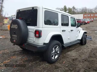 2021 Jeep Wrangler Unlimited Sahara with VIN 1C4HJXEG6MW751752, listed as a IAAI auction lot 41104960 with 47,460 mi miles and . Bid and sale history available at DreamBid. Image 4.