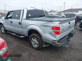 2014 Ford F-150 XL with VIN 1FTFW1EFXEKF79876, listed as a IAAI auction lot 42011856 with 161,366 mi miles and . Bid and sale history available at carsss.com. Image 3.