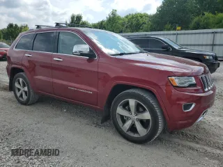 2015 Jeep Grand Cherokee Overland with VIN 1C4RJECG2FC823353, listed as a Copart auction lot 58367395 with 72,117 mi miles and Salvage title. Bid and sale history available at DreamBid. Image 4.
