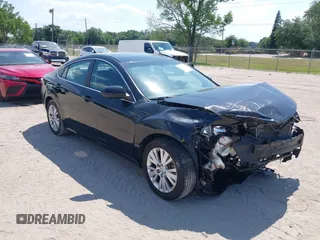 2010 Mazda 6 i Touring Plus z VIN 1YVHZ8CH9A5M37177, wystawiony jako IAAI lot #39241385 z przebiegiem 198 794 mil mil oraz . Historia ofert i sprzedaży dostępna na DreamBid. Obrazek 1.
