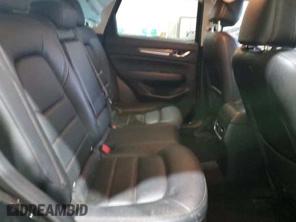 2018 Mazda CX-5 Grand Touring with VIN JM3KFADM3J0325843, listed as a Copart auction lot 87958375 with 93,577 mi miles and Salvage title. Bid and sale history available at DreamBid. Image 11.
