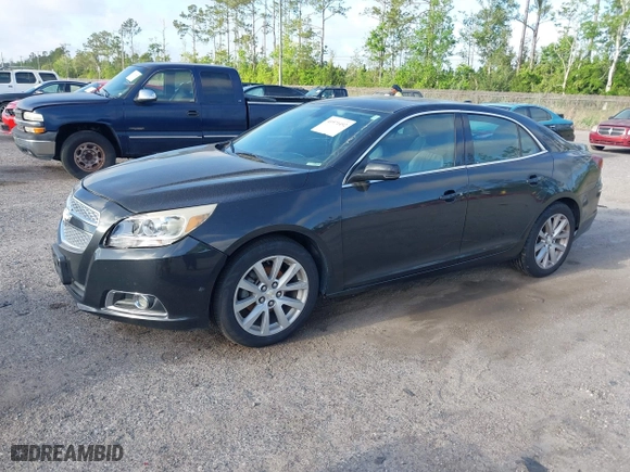 2013 Chevrolet Malibu LT with VIN 1G11E5SA6DF265901, listed as a IAAI auction lot 41971492 with 203,612 mi miles. Bid and sale history available at carsss.com. Image 2.