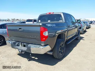 2014 Toyota Tundra 4WD Truck SR5 with VIN 5TFDY5F14EX377131, listed as a IAAI auction lot 41749424 with 150,203 mi miles. Bid and sale history available at carsss.com. Image 4.