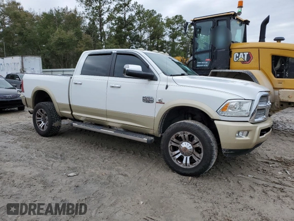 2014 Ram 2500 Longhorn with VIN 3C6UR5GL2EG266103, listed as a Copart auction lot 41712335 with 169,125 mi miles and Salvage Title. Bid and sale history available at carsss.com. Image 4.