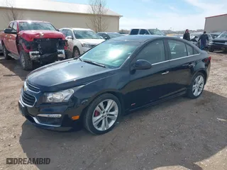 2015 Chevrolet Cruze LTZ with VIN 1G1PG5SBXF7178013, listed as a IAAI auction lot 41781195 with 122,494 mi miles. Bid and sale history available at carsss.com. Image 2.