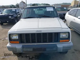 2000 Jeep Cherokee SE with VIN 1J4FF28S4YL162504, listed as a IAAI auction lot 41689558 with 174,476 mi miles. Bid and sale history available at carsss.com. Image 6.