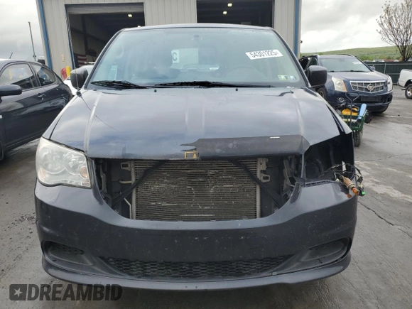 2014 Dodge Grand Caravan SE 30th Anniversary with VIN 2C4RDGBG1ER457489, listed as a Copart auction lot 54301225 with 157,740 mi miles and Salvage Title. Bid and sale history available at DreamBid. Image 5.