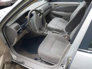 2001 Chevrolet Prizm z VIN 1Y1SK52841Z448303, wystawiony jako IAAI lot #42224410 z przebiegiem 160 577 mil mil oraz . Historia ofert i sprzedaży dostępna na DreamBid. Obrazek 5.