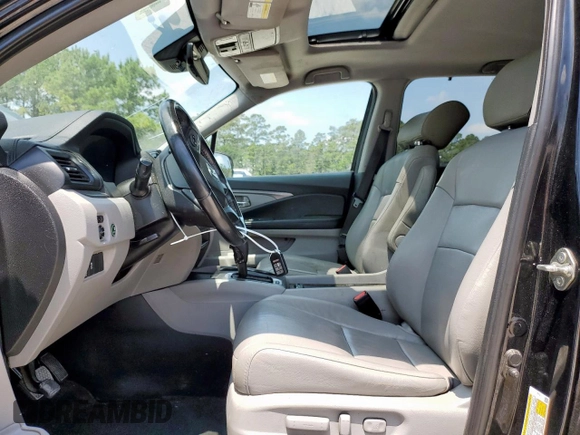 2019 Honda Pilot EX-L with VIN 5FNYF5H59KB044310, listed as a Copart auction lot 58580895 with 210,131 mi miles and Salvage title. Bid and sale history available at DreamBid. Image 7.