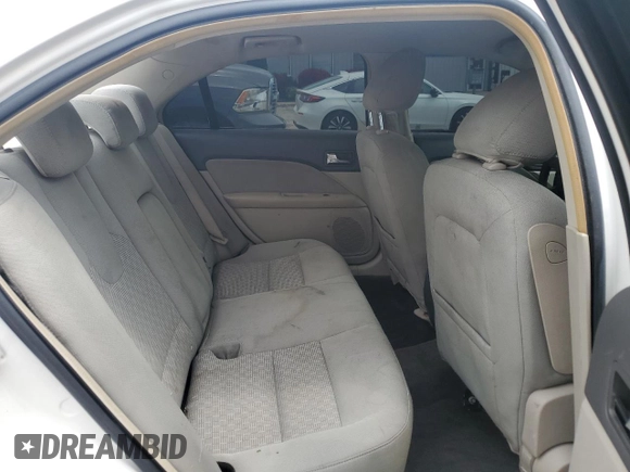 2010 Ford Fusion SE z VIN 3FAHP0HA9AR306505, wystawiony jako Copart lot #55057295 z przebiegiem 214 141 mil mil oraz Nie do naprawy • Non repairable. Historia ofert i sprzedaży dostępna na DreamBid. Obrazek 10.