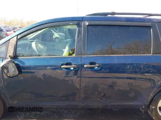 2012 Toyota Sienna with VIN 5TDKA3DCXCS013173, listed as a IAAI auction lot 41437317 with 175,263 mi miles and . Bid and sale history available at DreamBid. Image 15.