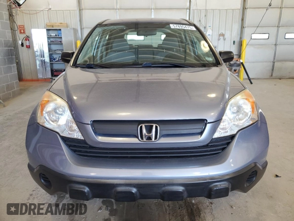 2007 Honda CR-V LX z VIN JHLRE383X7C040333, wystawiony jako Copart lot #57895475 z przebiegiem 124 156 mil mil oraz Szkoda całkowita • Salvage title. Historia ofert i sprzedaży dostępna na DreamBid. Obrazek 5.