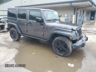 2016 Jeep Wrangler Unlimited Sport with VIN 1C4BJWDG1GL165418, listed as a Copart auction lot 61364095 with 123,772 mi miles and Salvage title. Bid and sale history available at DreamBid. Image 4.