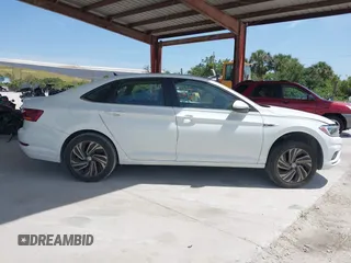 2019 Volkswagen Jetta SEL Premium z VIN 3VWGB7BU6KM168451, wystawiony jako IAAI lot #42090183 z przebiegiem 75 851 mil mil oraz . Historia ofert i sprzedaży dostępna na DreamBid. Obrazek 12.