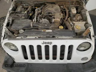 2013 Jeep Wrangler Unlimited Sport z VIN 1C4BJWDG8DL513680, wystawiony jako Copart lot #53805485 z przebiegiem 135 676 mil mil oraz Szkoda całkowita • Salvage title. Historia ofert i sprzedaży dostępna na DreamBid. Obrazek 12.