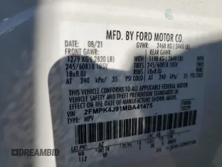 2021 Ford Edge SEL с VIN 2FMPK4J91MBA41475, выставлен на аукционе Copart как лот 63185385 с пробегом 46 639 миль миль и Списание • Salvage title. История ставок и продаж доступна на DreamBid. Изображение 14.