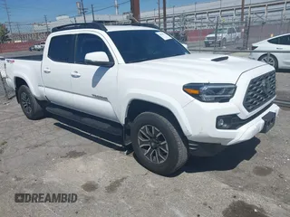 2023 Toyota Tacoma SR5 z VIN 3TMDZ5BN3PM160975, wystawiony jako IAAI lot #42024778 z przebiegiem 41 621 mil mil oraz . Historia ofert i sprzedaży dostępna na DreamBid. Obrazek 1.