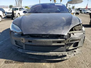 2020 Tesla Model S Long Range с VIN 5YJSA1E29LF366969, выставлен на аукционе Copart как лот 88164585 с пробегом 114 809 миль миль и Списание • Salvage title. История ставок и продаж доступна на DreamBid. Изображение 5.