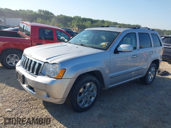 2008 Jeep Grand Cherokee Overland with VIN 1J8HR68M68C242958, listed as a IAAI auction lot 42820206 with 214,472 mi miles and . Bid and sale history available at DreamBid. Image 2.