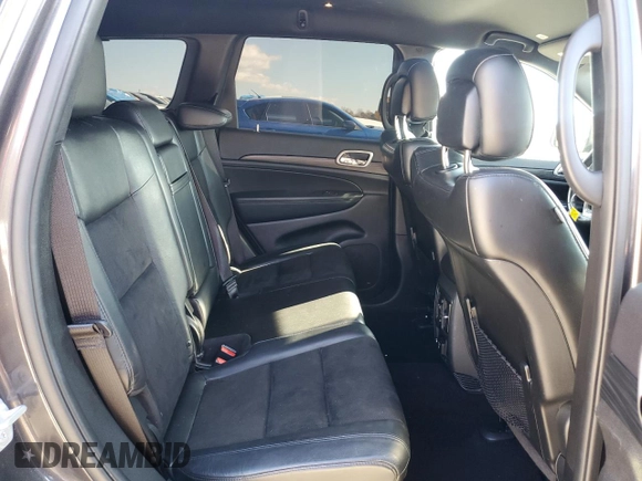 2020 Jeep Grand Cherokee Laredo E with VIN 1C4RJEAG8LC391401, listed as a Copart auction lot 80630874 with 122,083 mi miles and Salvage title. Bid and sale history available at DreamBid. Image 11.