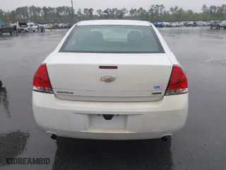2015 Chevrolet Impala Limited LS with VIN 2G1WA5E34F1125046, listed as a IAAI auction lot 41972602 with 253,674 mi miles. Bid and sale history available at carsss.com. Image 16.