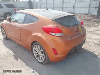 2012 Hyundai Veloster w/Gray Int with VIN KMHTC6AD5CU074516, listed as a IAAI auction lot 42061623 with 133,338 mi miles. Bid and sale history available at carsss.com. Image 3.