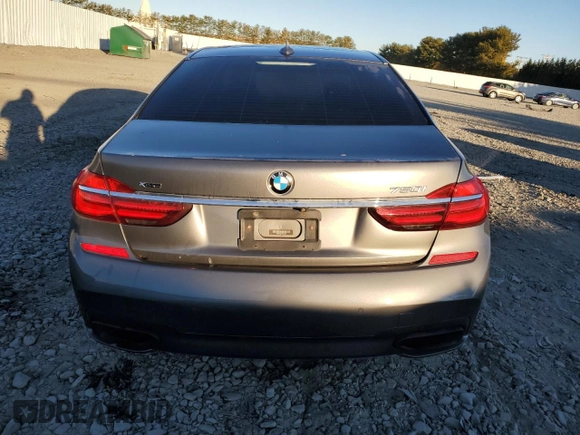 2017 BMW 7 Series with VIN WBA7F2C32HG422866, listed as a Copart auction lot 76177184 with 146,565 mi miles and Salvage Title. Bid and sale history available at DreamBid. Image 6.