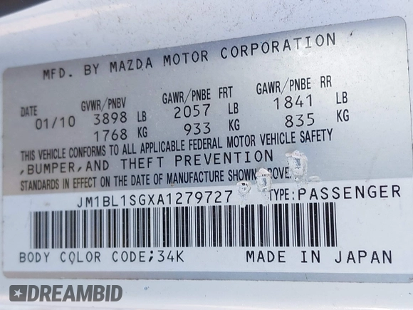 2010 Mazda Mazda3 i Touring with VIN JM1BL1SGXA1279727, listed as a IAAI auction lot 41975536 with 164,891 mi miles. Bid and sale history available at carsss.com. Image 9.