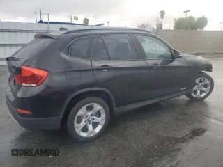 2015 BMW X1 sDrive28i with VIN WBAVM1C55FVW56937, listed as a Copart auction lot 45050785 with 77,736 mi miles and Salvage Title. Bid and sale history available at carsss.com. Image 3.