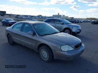 2002 Mercury Sable GS with VIN 1MEFM50U12A634444, listed as a IAAI auction lot 40588478 with 153,255 mi miles. Bid and sale history available at carsss.com. Image 1.