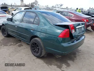 2001 Honda Civic LX with VIN JHMES16571S002955, listed as a IAAI auction lot 42128296 with 223,009 mi miles and . Bid and sale history available at DreamBid. Image 3.